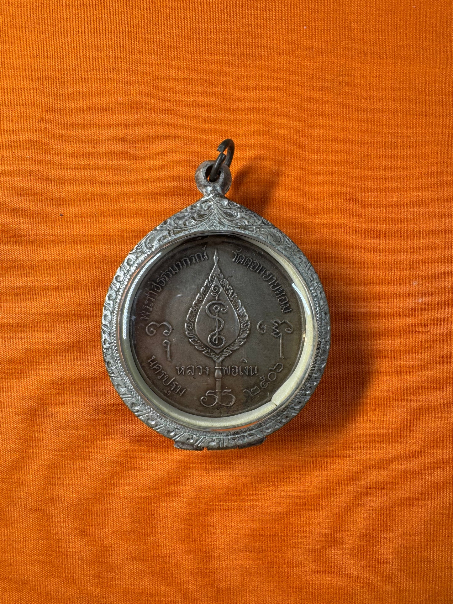 Luang Pho Ngern “Jiggo” Coin Amulet
Protection & Prosperity Amulet