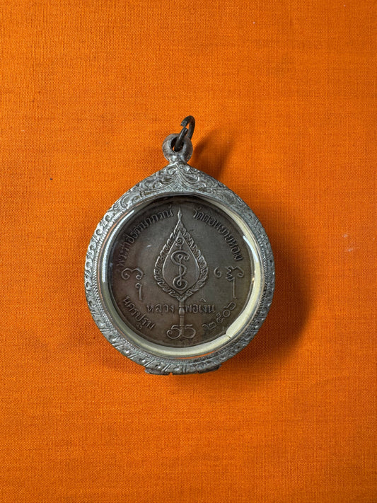 Luang Pho Ngern “Jiggo” Coin Amulet
Protection & Prosperity Amulet
